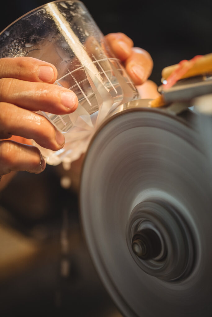 glassblower polishing grinding glassware