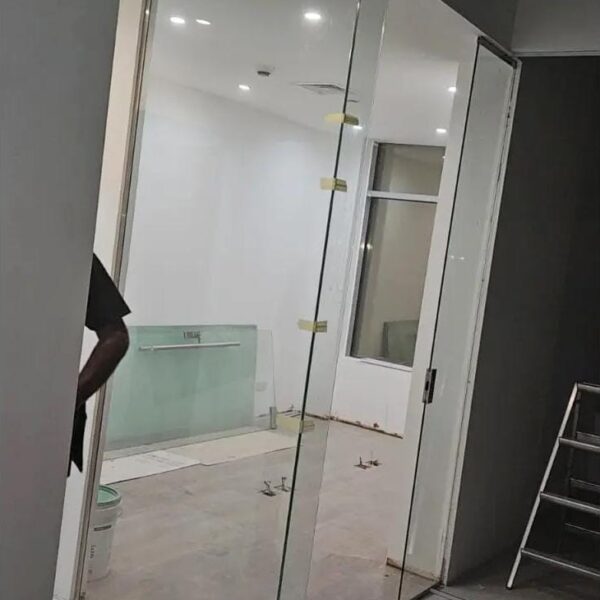 Glass Office Cubicles - Al Zumorradah: Custom glass office cubicles providing a sleek, professional, and functional workspace design.